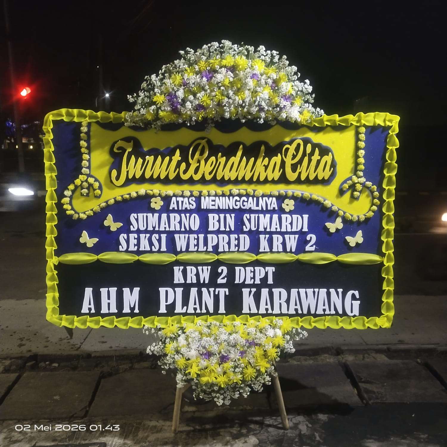 Papan bunga ucapan duka cita